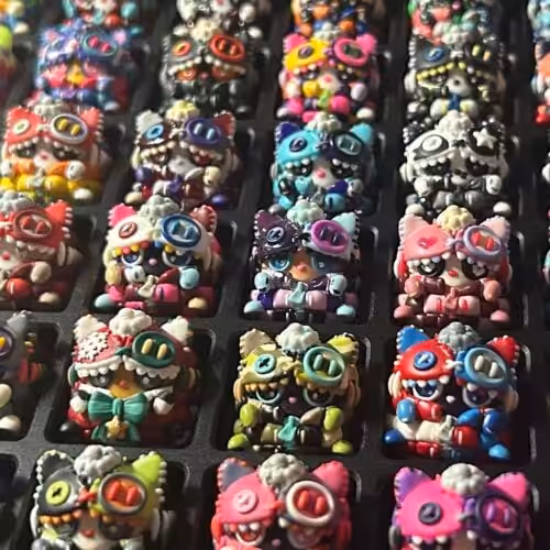 Colorful collection of miniature monster figurines.