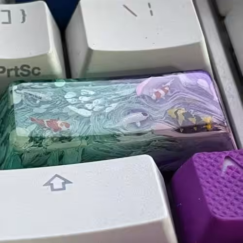 "When you work from home and stare at your keyboard all day, it’s nice to have a @jelly.key Koi keycap to bring peace and tranquillity to your life. This thing is beautiful. The craftsmanship is all hand painted and hand made. And these Koi are so damn small. I don’t know how they did it. And the box they send it in is top notch too." by mstarr512 on Instagram